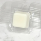 a container of milk sitting on top of a marble counter